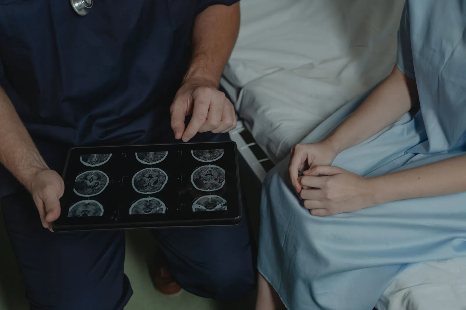 Neurosurgeon reviewing spine imaging